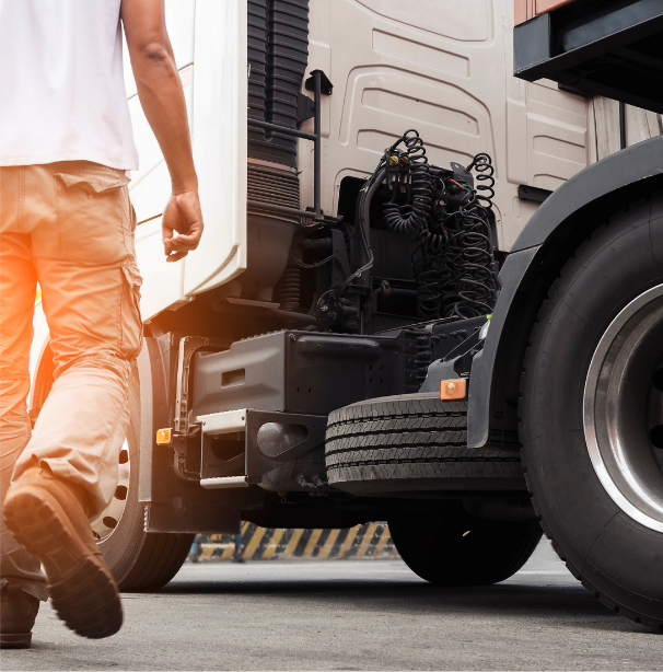 Truck driver walking towards truck